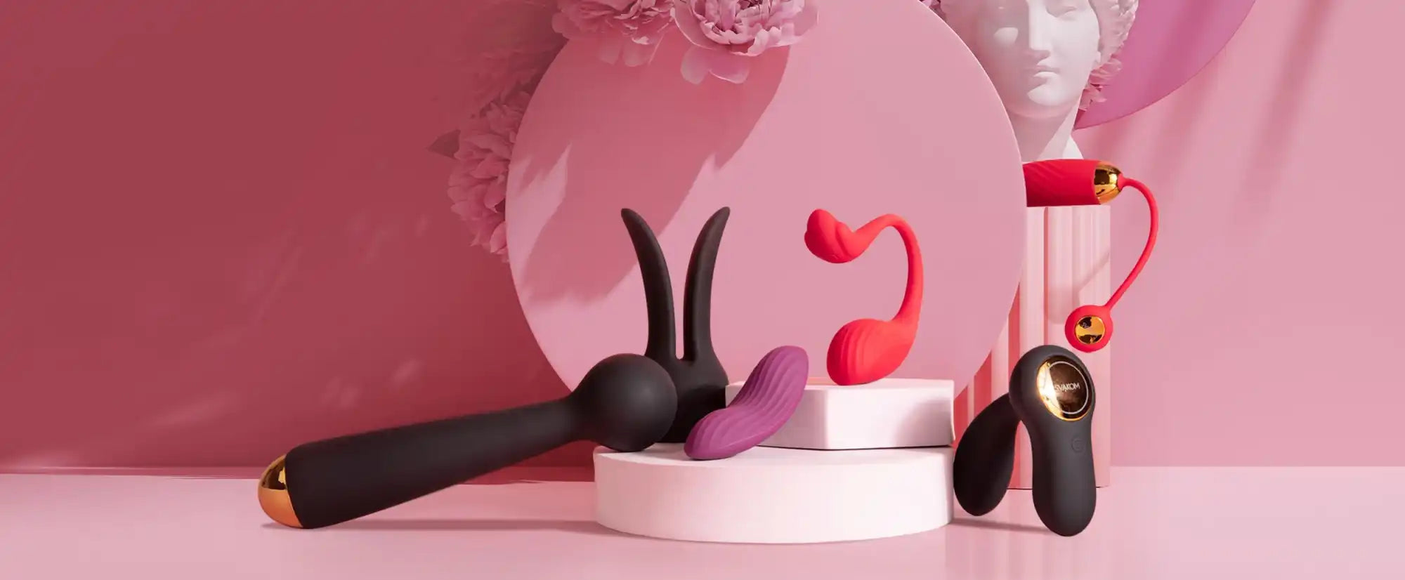 A collection of vibrators in various shapes, sizes, and colors.
